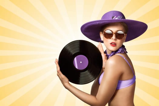 Beautiful pinup bikini model wearing sunglasses and hat, holding an LP microgroove vinyl record on colorful abstract cartoon style background.