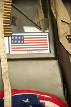American flag on the windshield of a military vehicle for D-Day