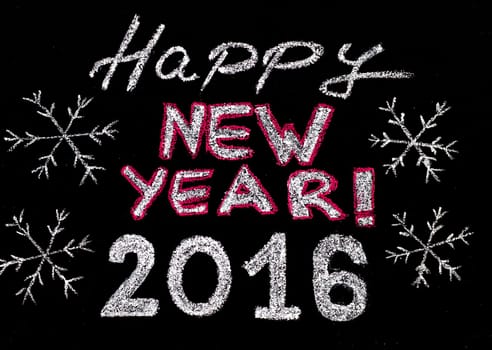 Happy new year 2016, hand writing with chalk on blackboard, vintage concept