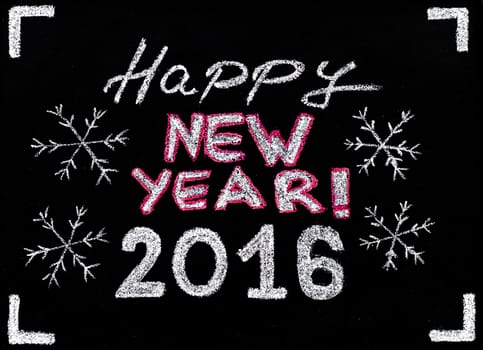 Happy new year 2016, hand writing with chalk on blackboard, vintage concept