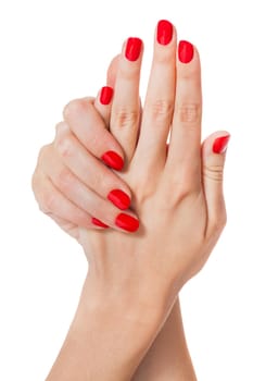 Women's hands with beautiful well-groomed fingers and red nail polish wellness beauty spa close up isolated on white background