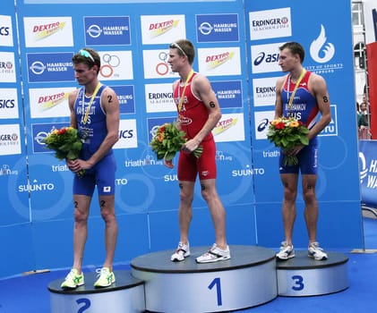 Triathlon - ITU Worldchampionship Hamburg of the Elite Maenner Award Ceremony / Brad Kahlefeld,Jarrod Shoemaker ,Alexander Brukhankov /
