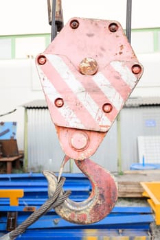 A close up of the hook on a crane.