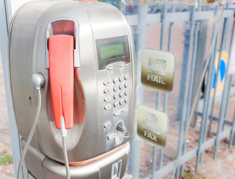 Old public payphone, no longer in operation.