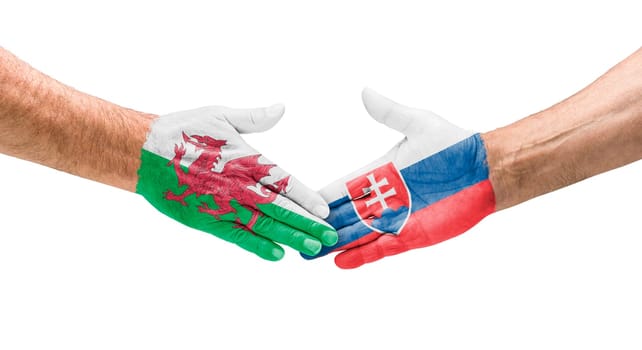 Football teams - handshake between Wales and Slovakia
