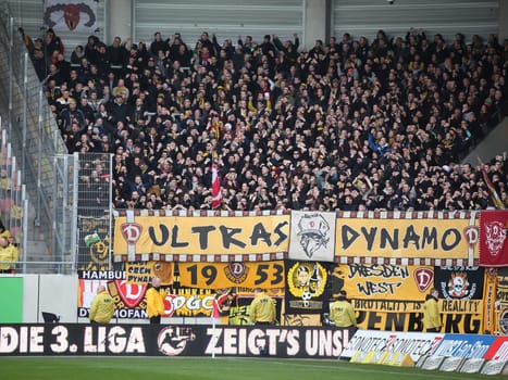 Guest fan block Dynamo Dresden at the 3rd league season 2015/2016 point game Hallescher FC against SG Dynamo Dresden