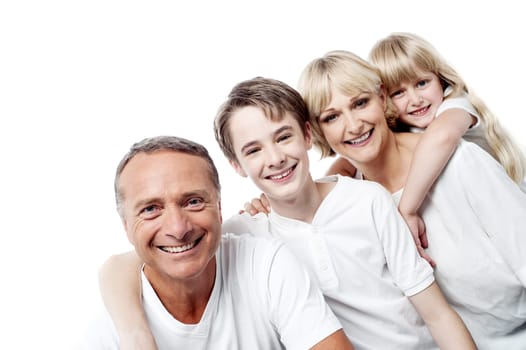 Beautiful happy family - isolated over a white background.