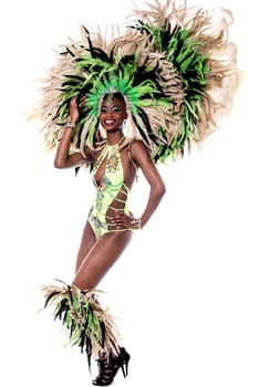 Beautiful young samba dancer in stage costume