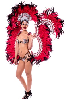 Beautiful samba dancer wearing traditional red costume
