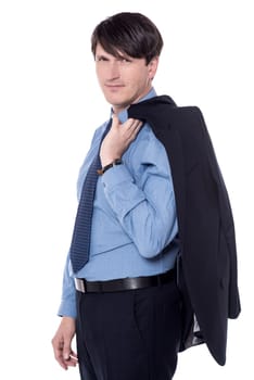 Businessman holding his coat over his shoulder.