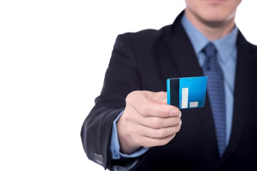 Cropped image of businessman giving credit card.