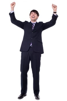 Successful businessman celebrating - isolated over a white background