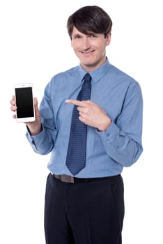 Businessman pointing his index finger at smart phone.