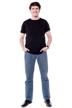 Happy man standing isolated on white background.