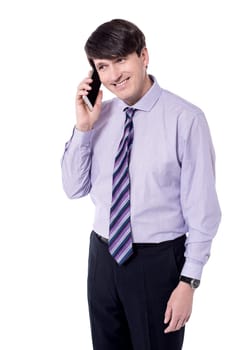 Successful businessman talking on his cell phone.