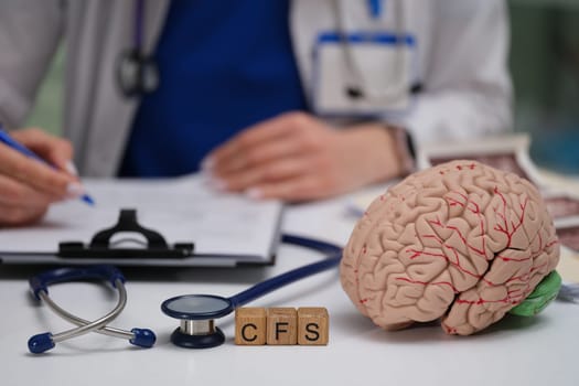 A knowledgeable medical professional is thoroughly analyzing complex data that relates to Chronic Fatigue Syndrome