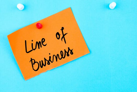 Line Of Business written on orange paper note pinned on cork board with white thumbtack, copy space available