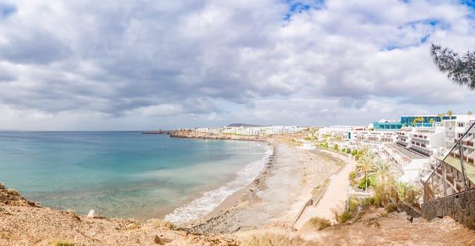 View from above,on the blue bay of Las Coloradas in Lanzarote with crystal clear water