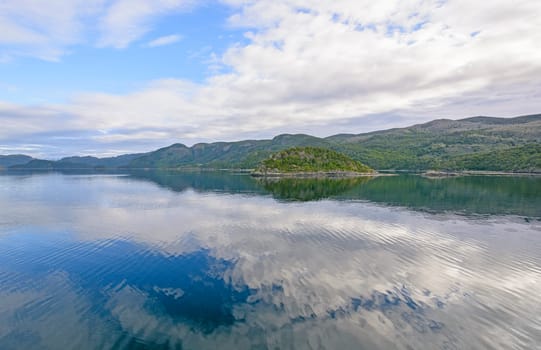 Blue Skies and Ocean Reflections in the Beagle Channel of Tierra del Fuego of Chile