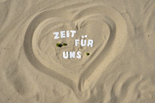 Time for me text in the sand