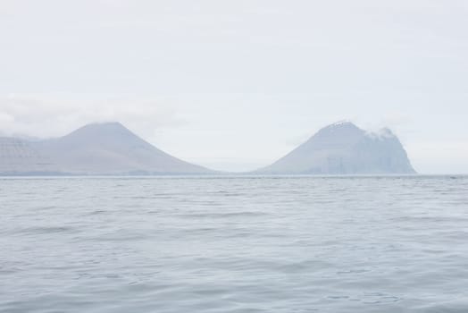 Typical landscape on the Faroe Islands, with the island Vidoy seen from the east