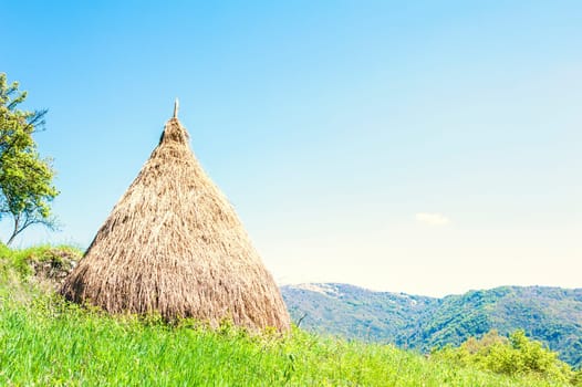 Traditional haystack of mountain villages in Italian Alps.