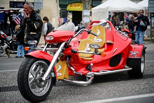 A tricycle to a gathering of American motorcycle in the town of Beaucaire in the French department of Gard