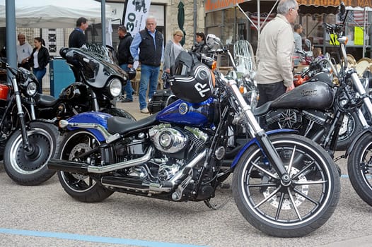 a group of motorcycles from a gathering of American motorcycle in the town of Beaucaire in the French department of Gard