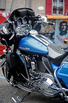 Close-up on a Harley Davidson with custom art to a gathering of American motorcycles in Beaucaire in the French department of Gard