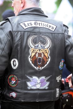 Embroidery on the back of a biker jacket in a gathering of American motorcycles in Beaucaire in the French department of Gard