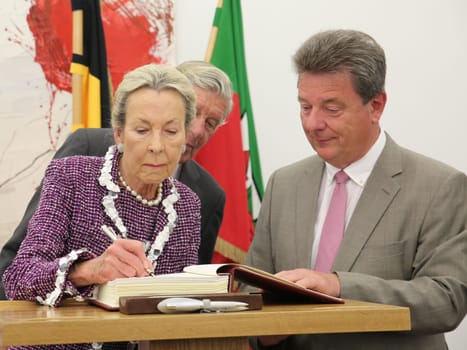 Edda Darboven (wife of Albert Darboven) enters herself in the guest book of the state capital Magdeburg at the reception by the Mayor Dr. Lutz Trümper (independent) on May 22,2016