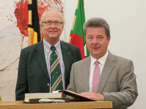 Eduard,Prince of Anhalt,enters himself in the guest book of the state capital Magdeburg at the reception by the Mayor Dr. Lutz Trümper (independent) on 22 May 2016