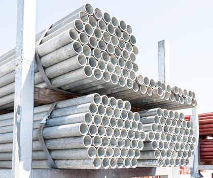 Steel Pipes bunch on the rack in warehouse