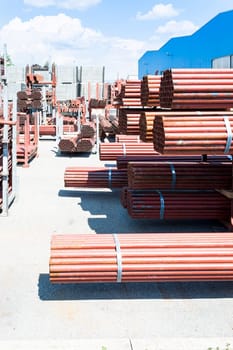 Steel Pipes bunch on the rack in warehouse