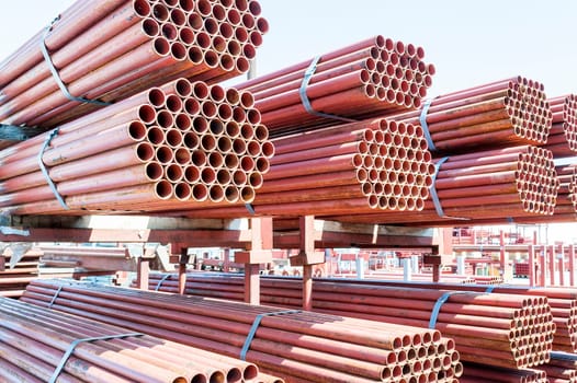 Steel Pipes bunch on the rack in warehouse