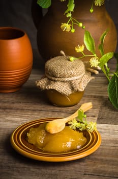 Saucer with lime honey on the table,.close-up
