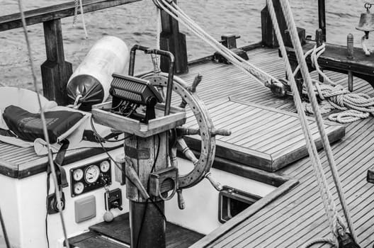 Steering wheel and deck of the old boat