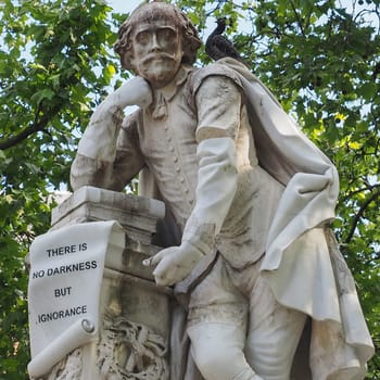 LONDON, UK - CIRCA JUNE 2015: Statue of William Shakespeare built in 1874 in Leicester Square in London