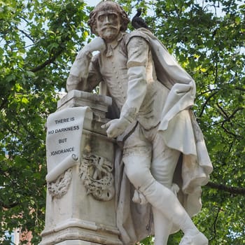 LONDON, UK - CIRCA JUNE 2015: Statue of William Shakespeare built in 1874 in Leicester Square in London