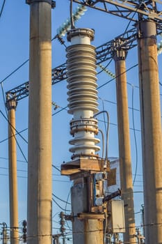 electric insulator on the background of blue sky