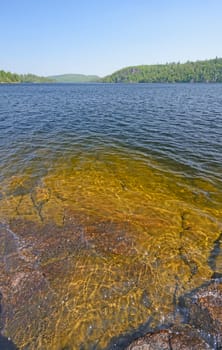 Sun Shining on an Underwater Rock in Winchell Lake in the Boundary Waters of Minnesota