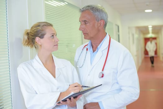 Two medics in discussion