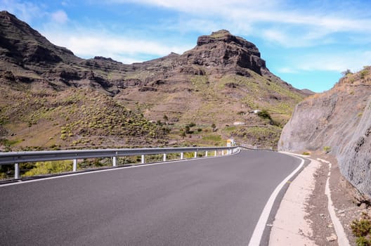 Long Empty Desert Asphalt Road in Canary Islands Spain