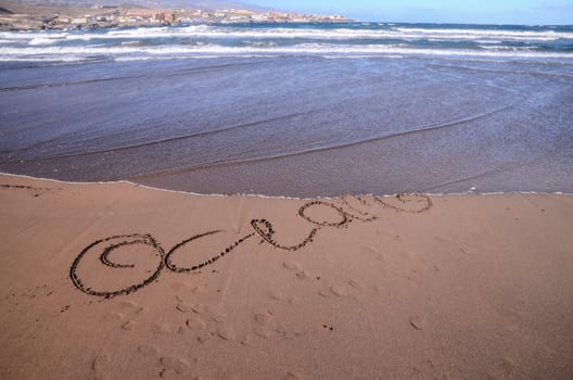 Word Written on the Sand of a Tropical beach
