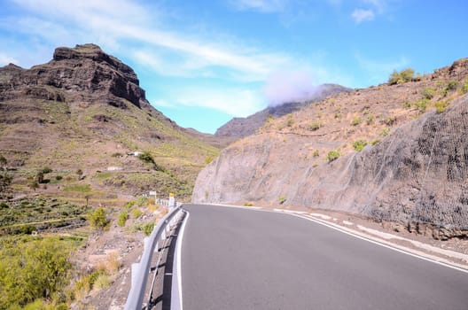 Long Empty Desert Asphalt Road in Canary Islands Spain