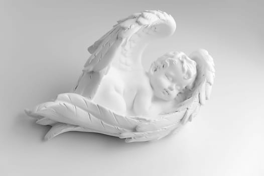 Little Sleeping Angel on white background, black and w