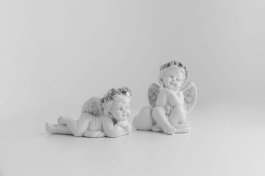 Little Sleeping Angel on white background, black and w