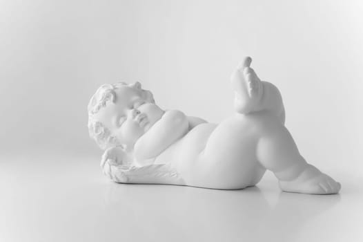 Little Sleeping Angel on white background, black and w