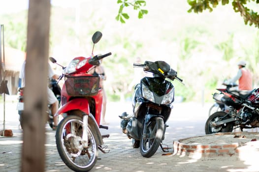Motorcycles parked on the popular tourist resort of Asia in the world.