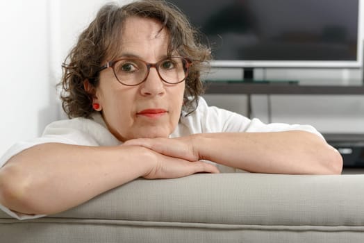 portrait of beautiful middle-aged woman with eyeglasses